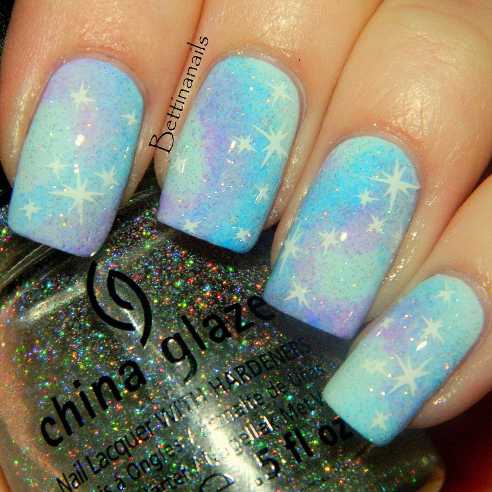 Новогодний маникюр со звездочками