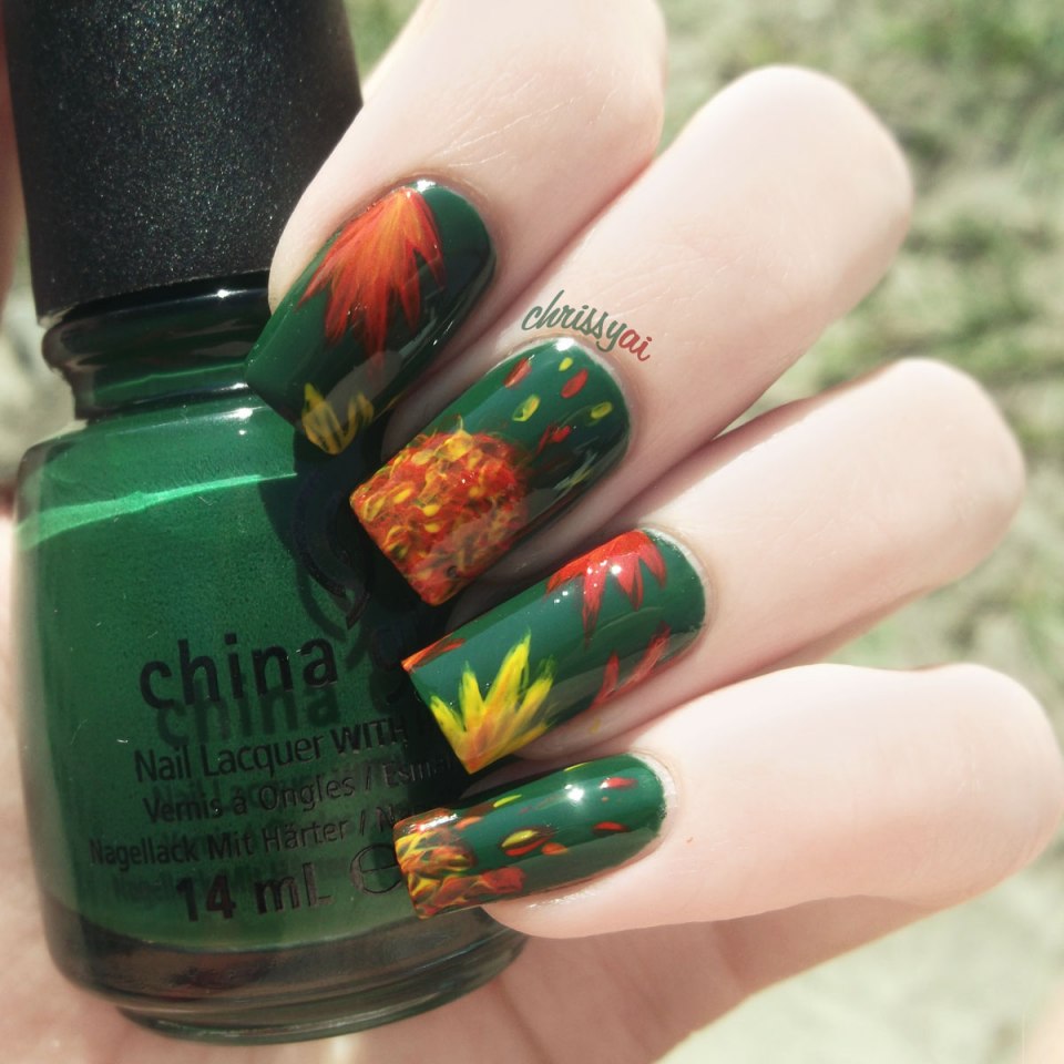 Осенний маникюр зеленый с оранжевым