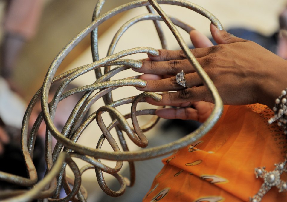 Крис Уолтон обладательница самых длинных ногтей