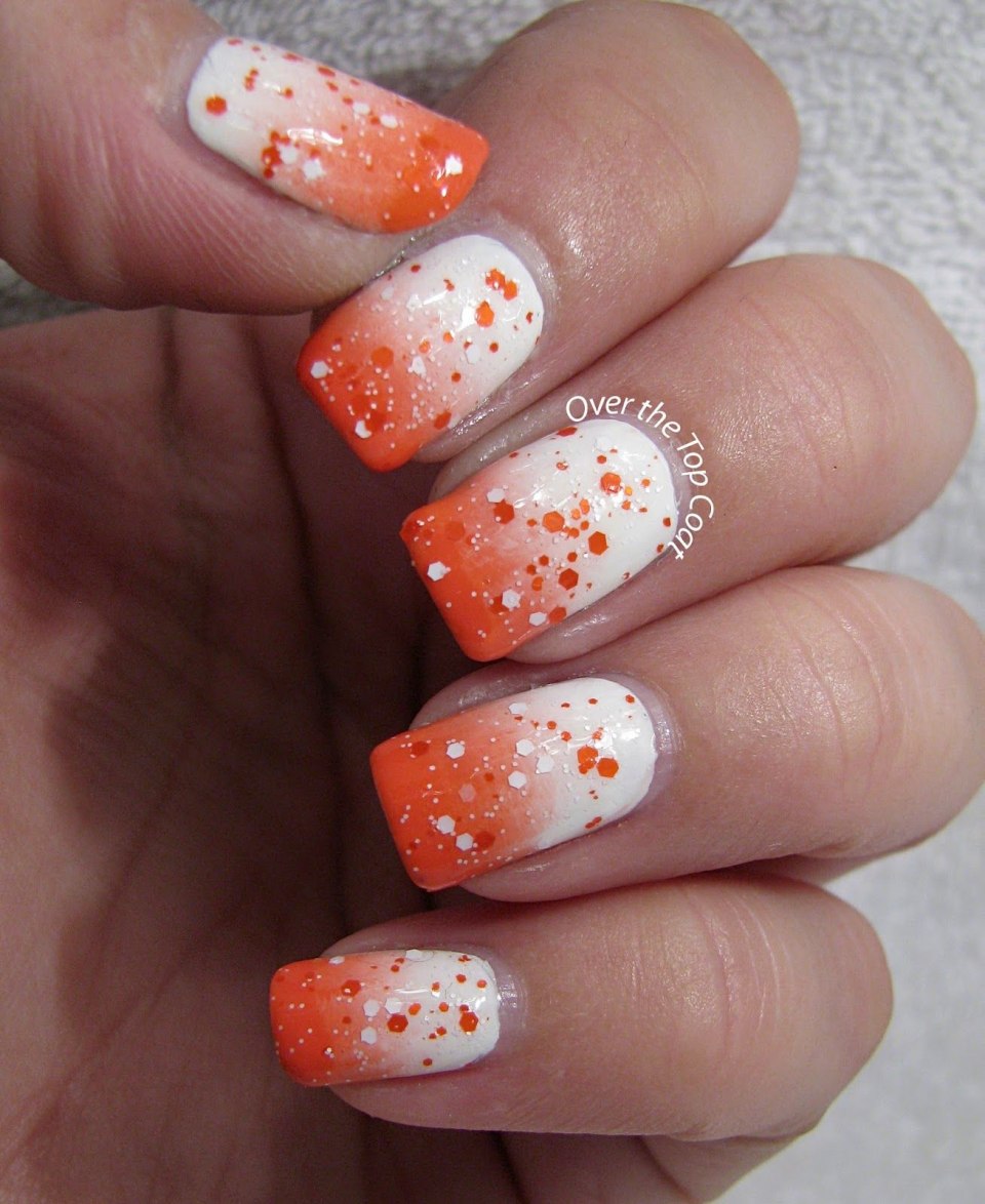 Оранжевые ногти с перепелиными яйцами